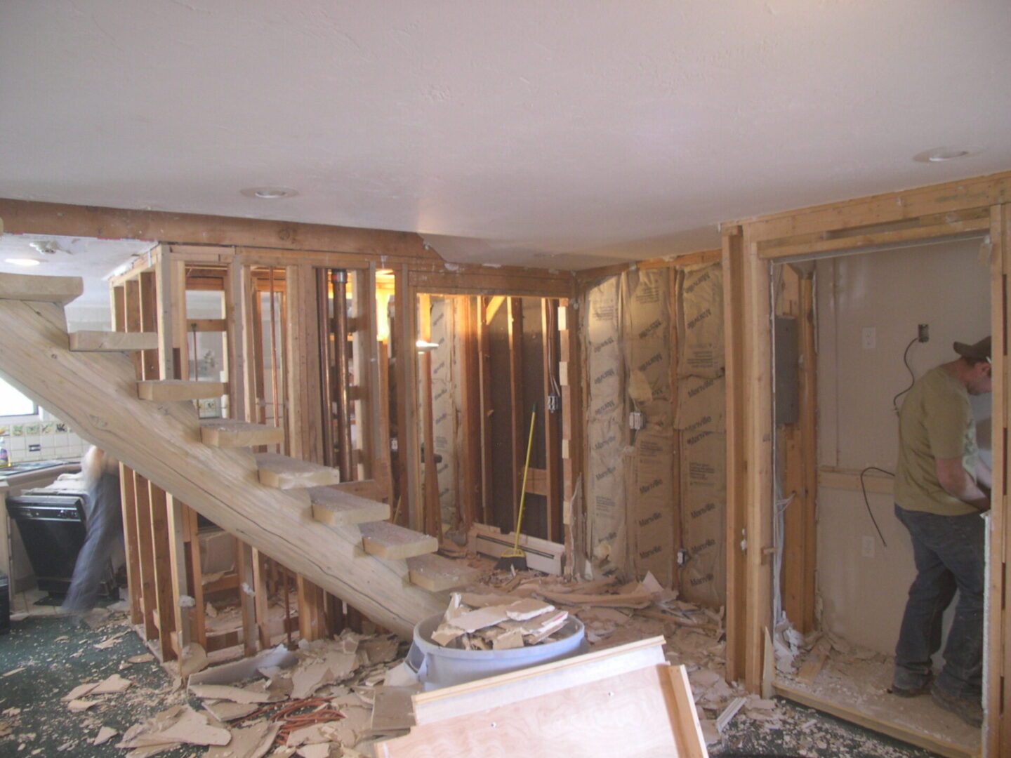 A room being remodeled with wood and insulation.