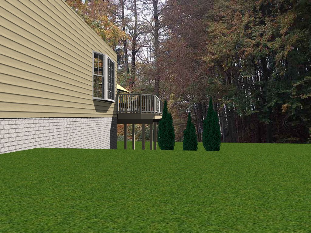 A yard with trees and bushes in the grass.