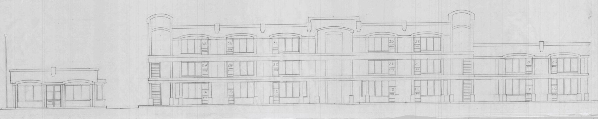 A drawing of the front of an apartment building.