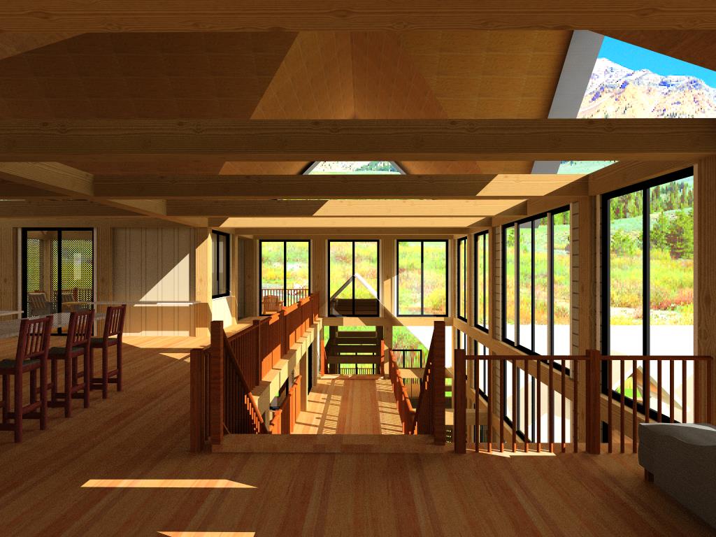 A large open room with wooden floors and windows.