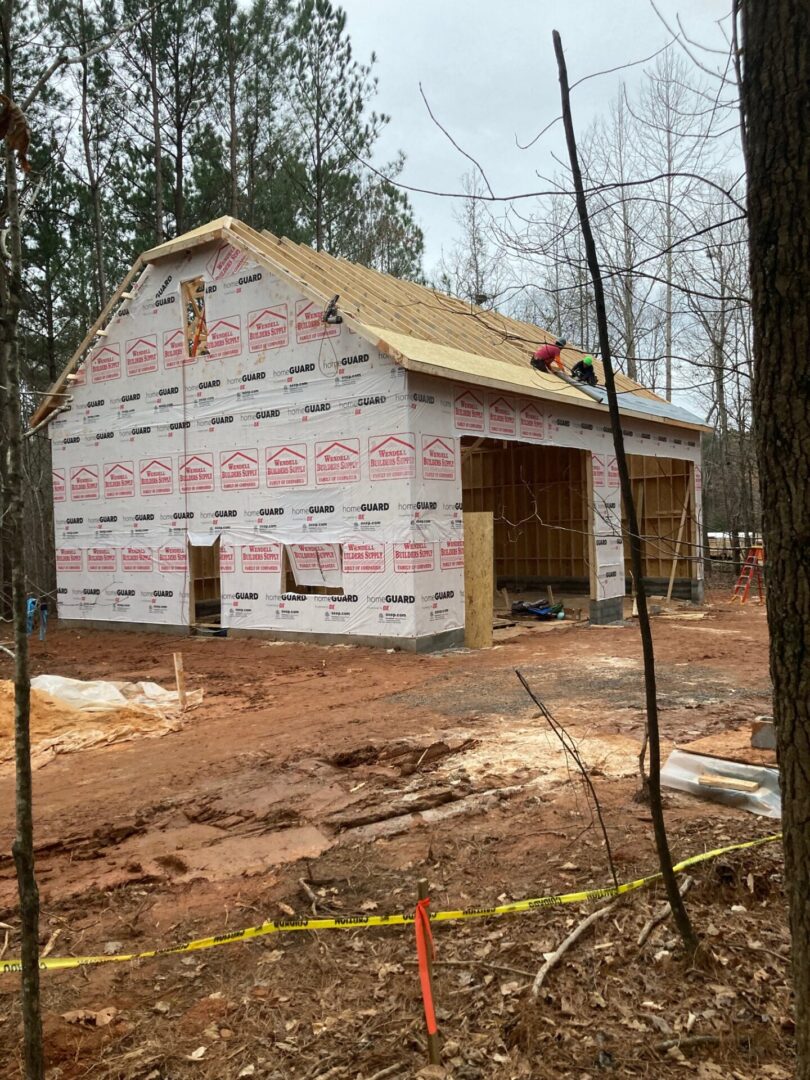 A building under construction with some tape on it